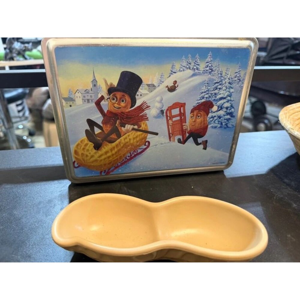 This is a two-piece Mr. Peanut collectible lot.